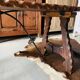 Table basse brutaliste en bois et fer forgé