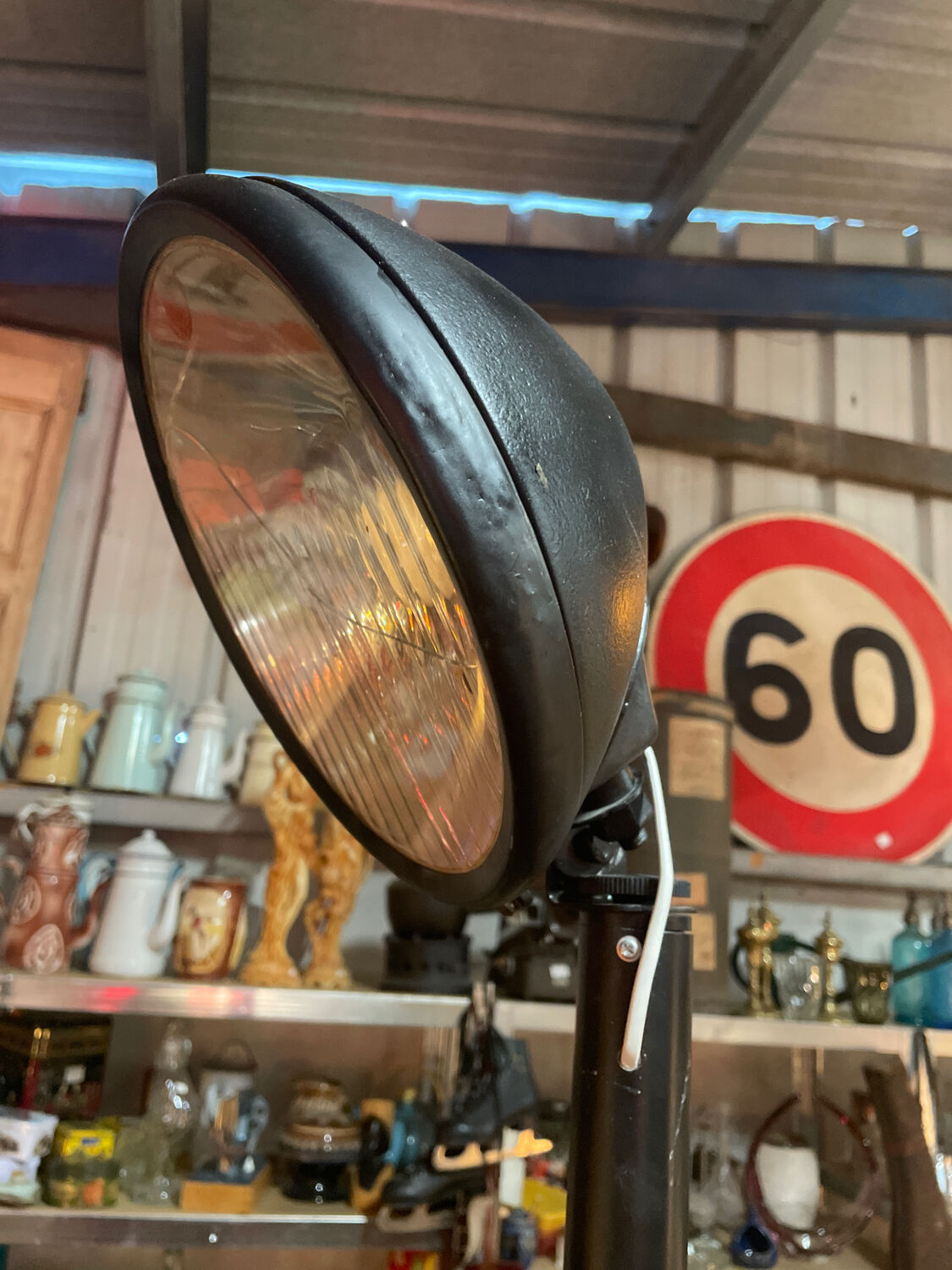Vintage car headlight lamp mounts in lamp
