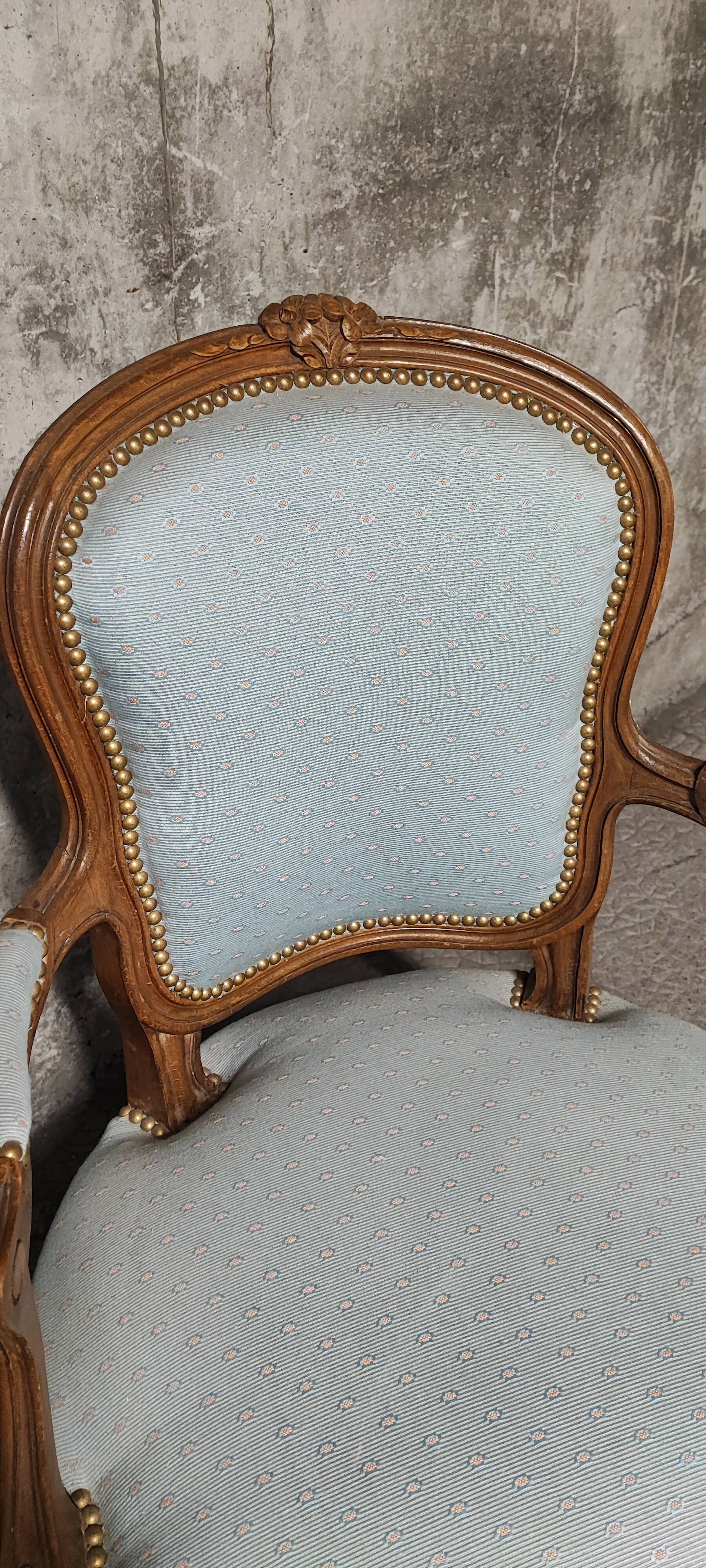 Reupholstered Louis XV convertible armchairs