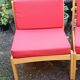 Set of 3 vintage armchairs from the 60s/70s – light wood and red faux leather.