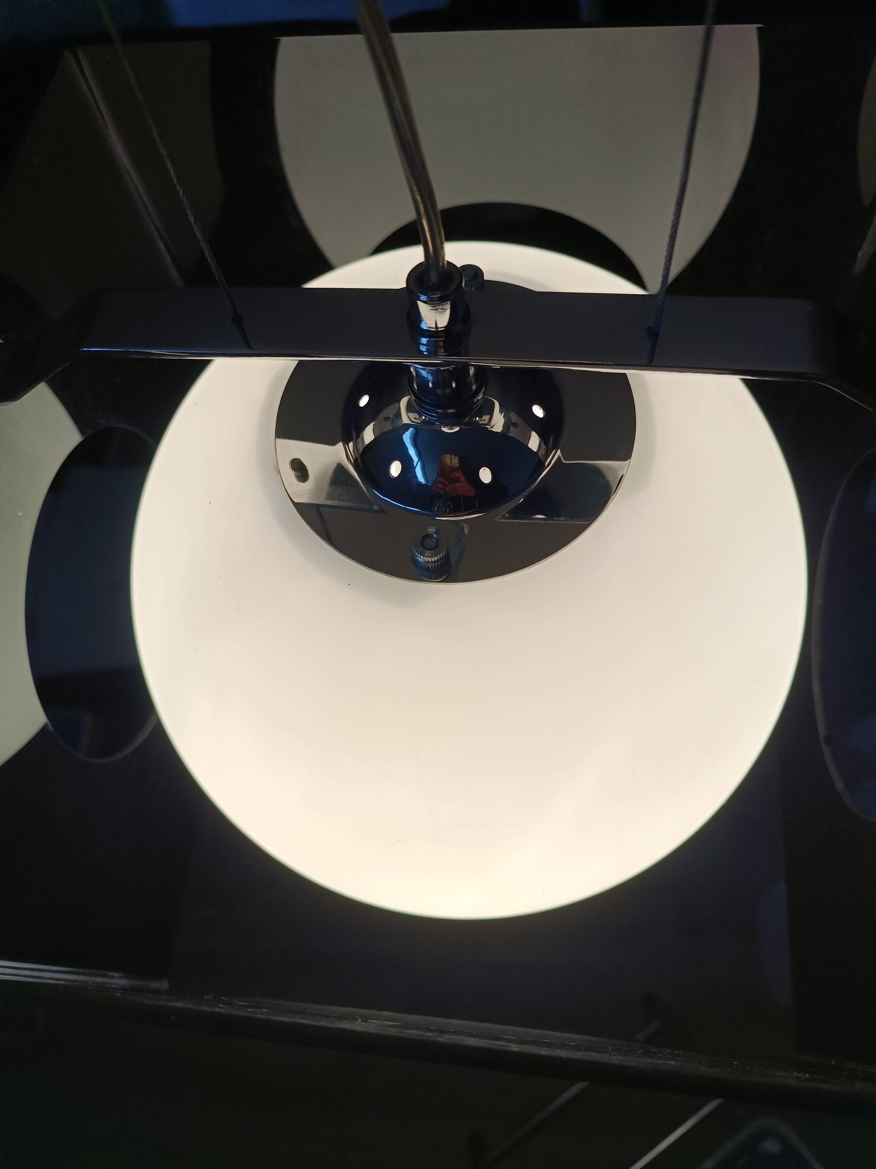 Suspended lamp design in smoked plexiglass from the 1990s.