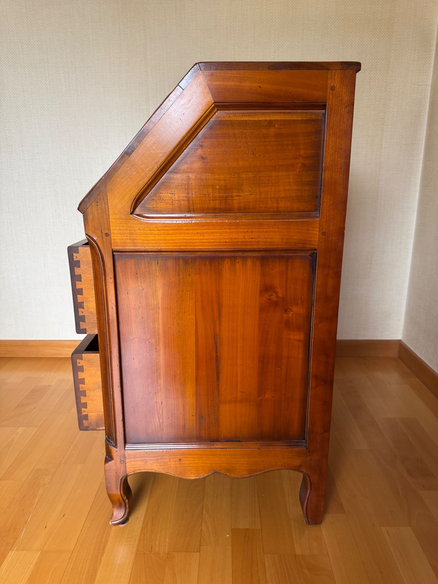 Secretary with drop-down front, signed Jean Laick, master cabinetmaker, cherry wood.