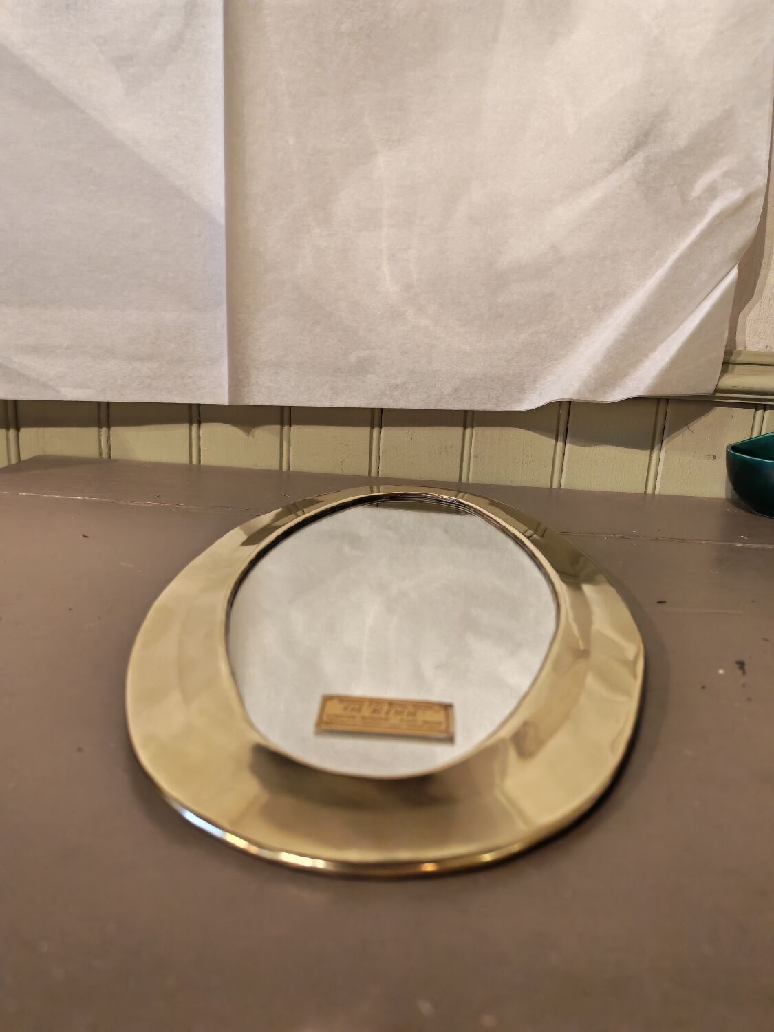 Vintage Urdu mirror in brass