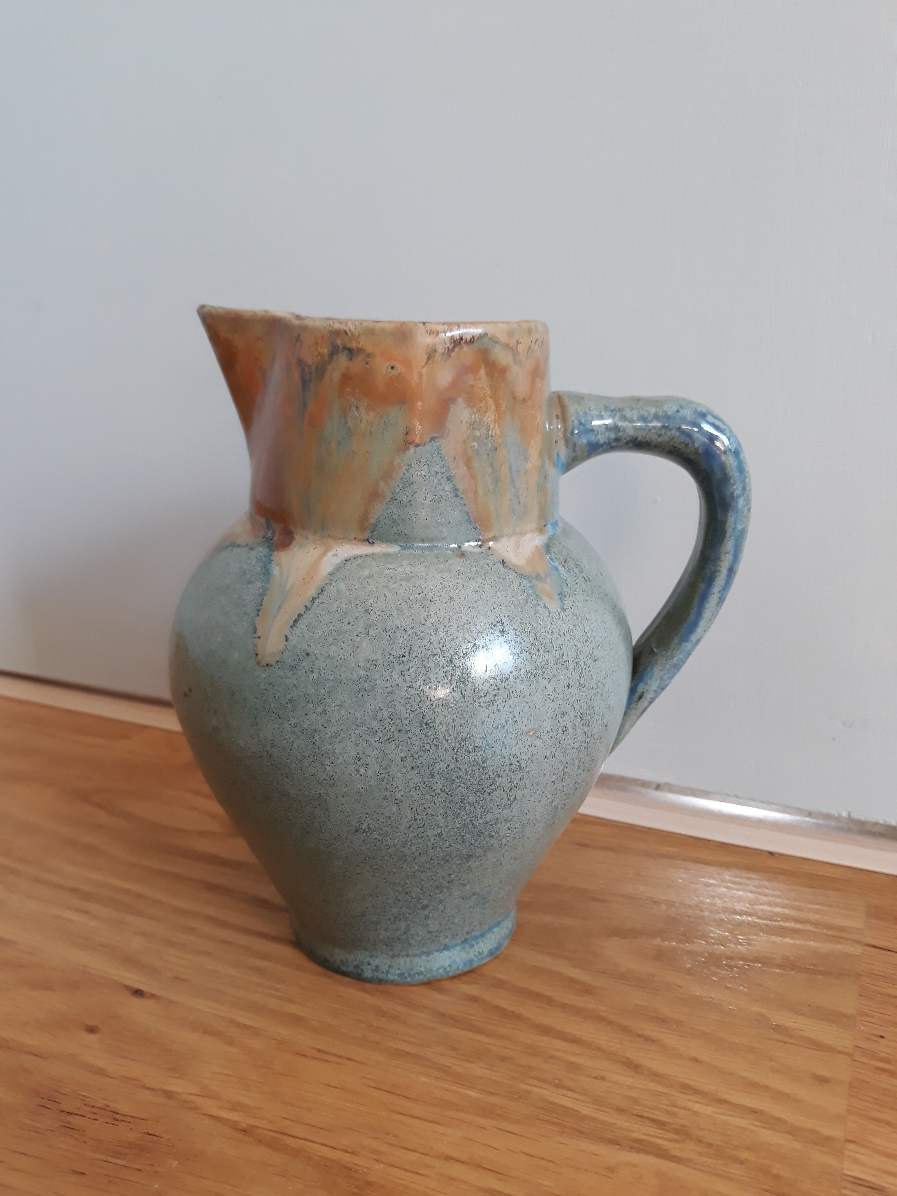Pitcher ceramic  tones blue, green and caramel