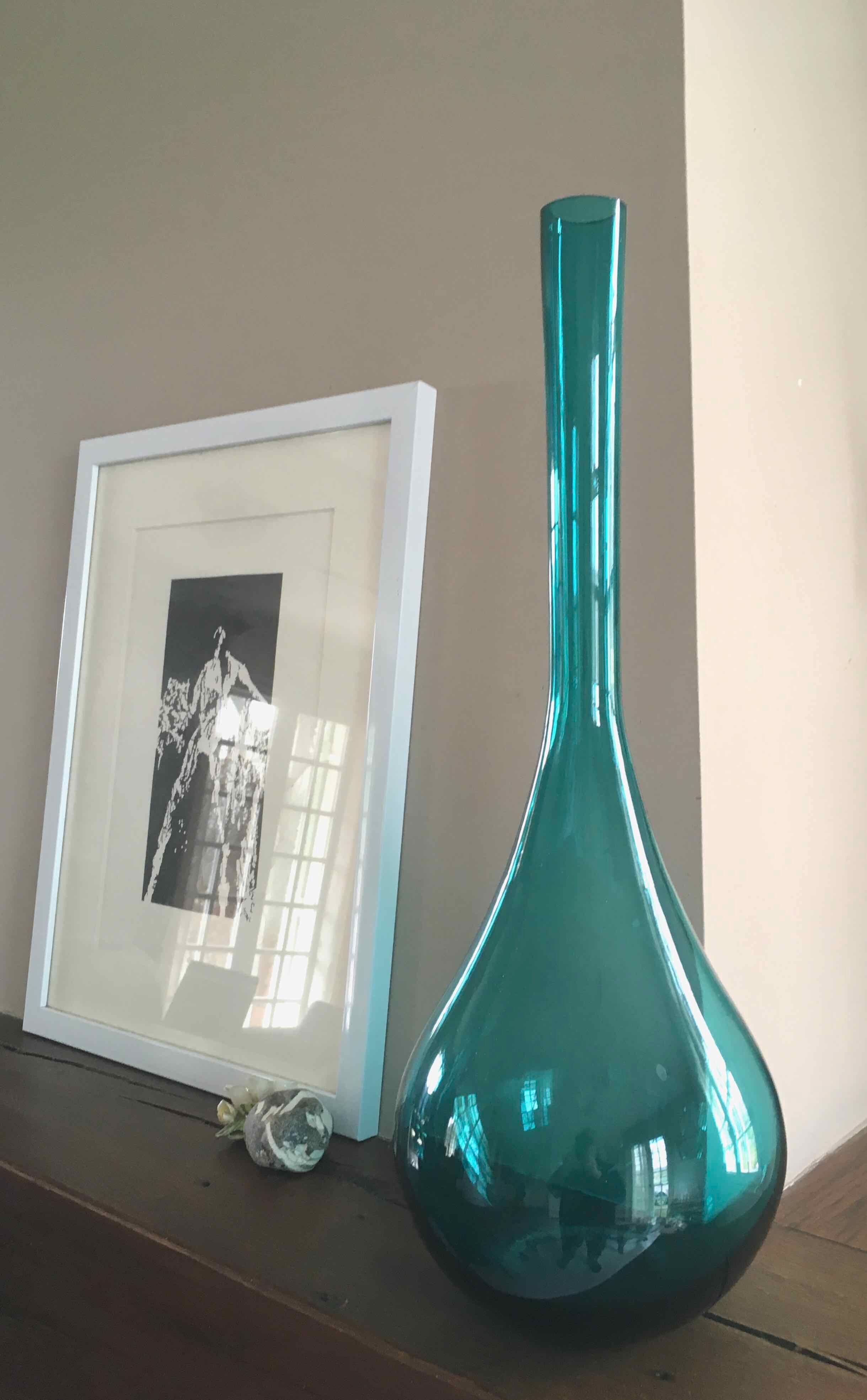 Large blown glass bottle