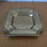 Brass pocket emptier