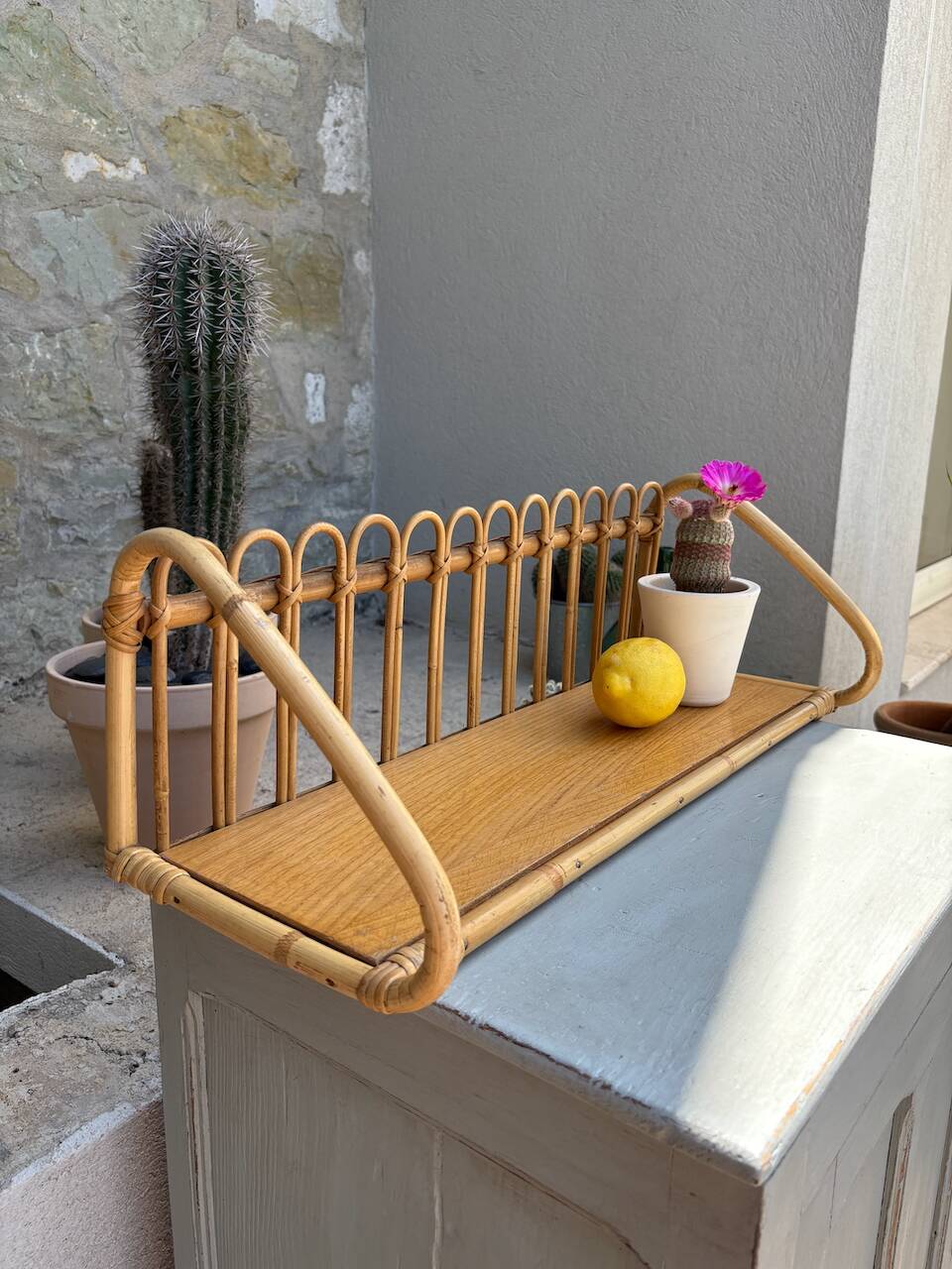 Superb and rare vintage rattan shelf.