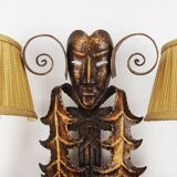Pair of wrought iron sconces "Venetian masks"