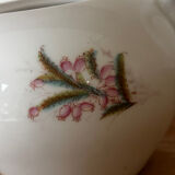 Beautiful vintage porcelain sugar bowl with a floral pattern.