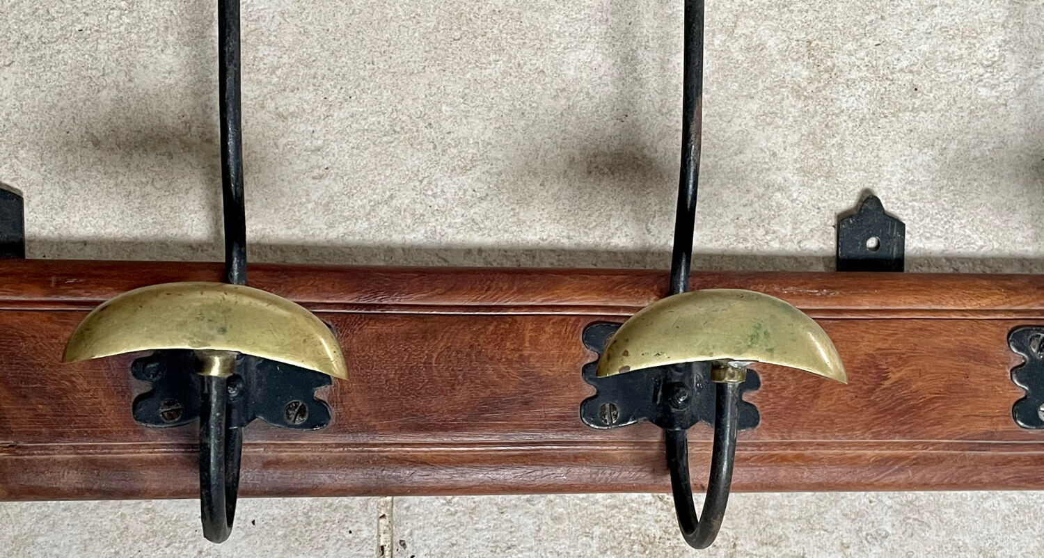 Wood and brass coat rack
