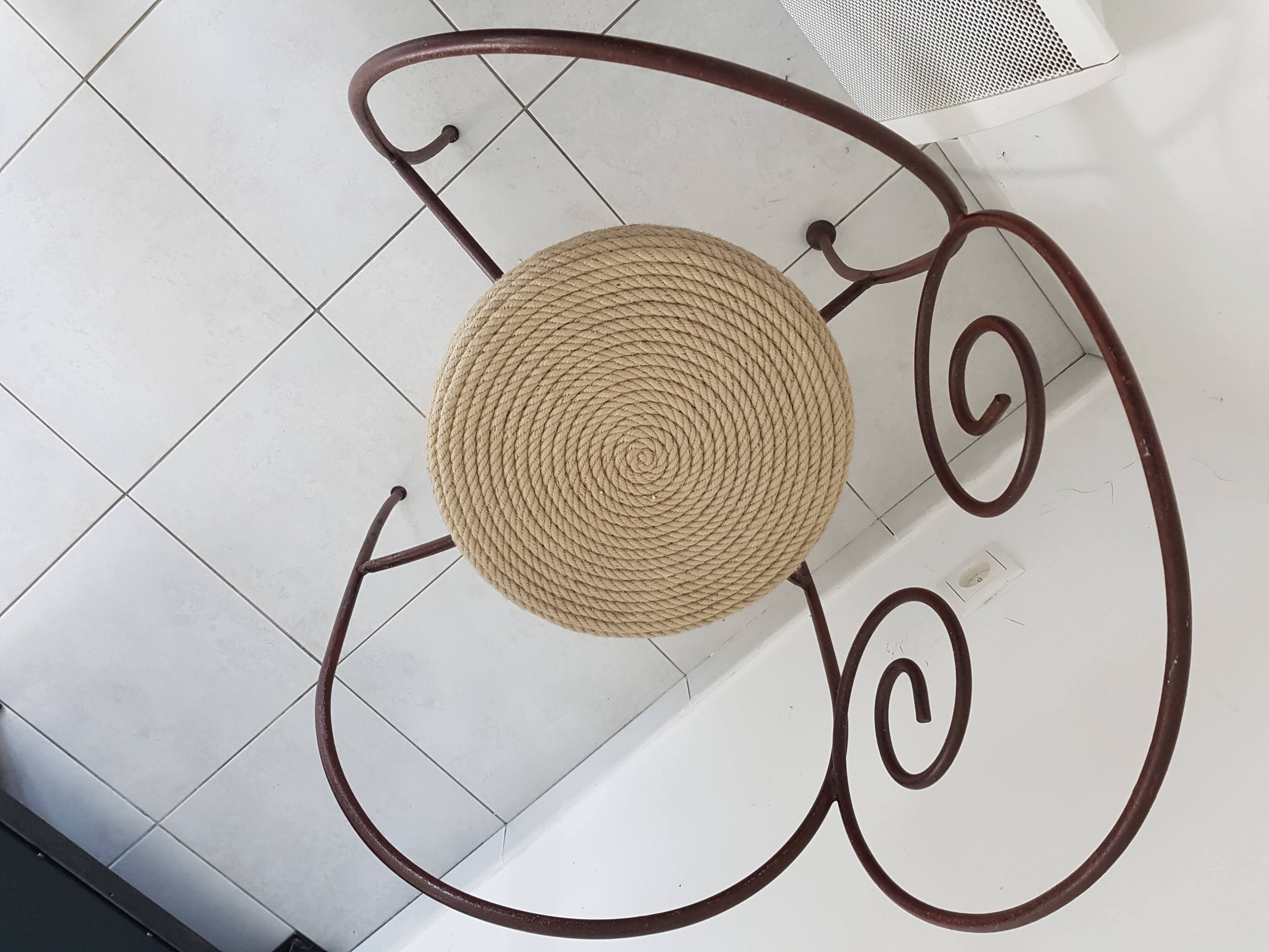 Wrought iron and rope chair