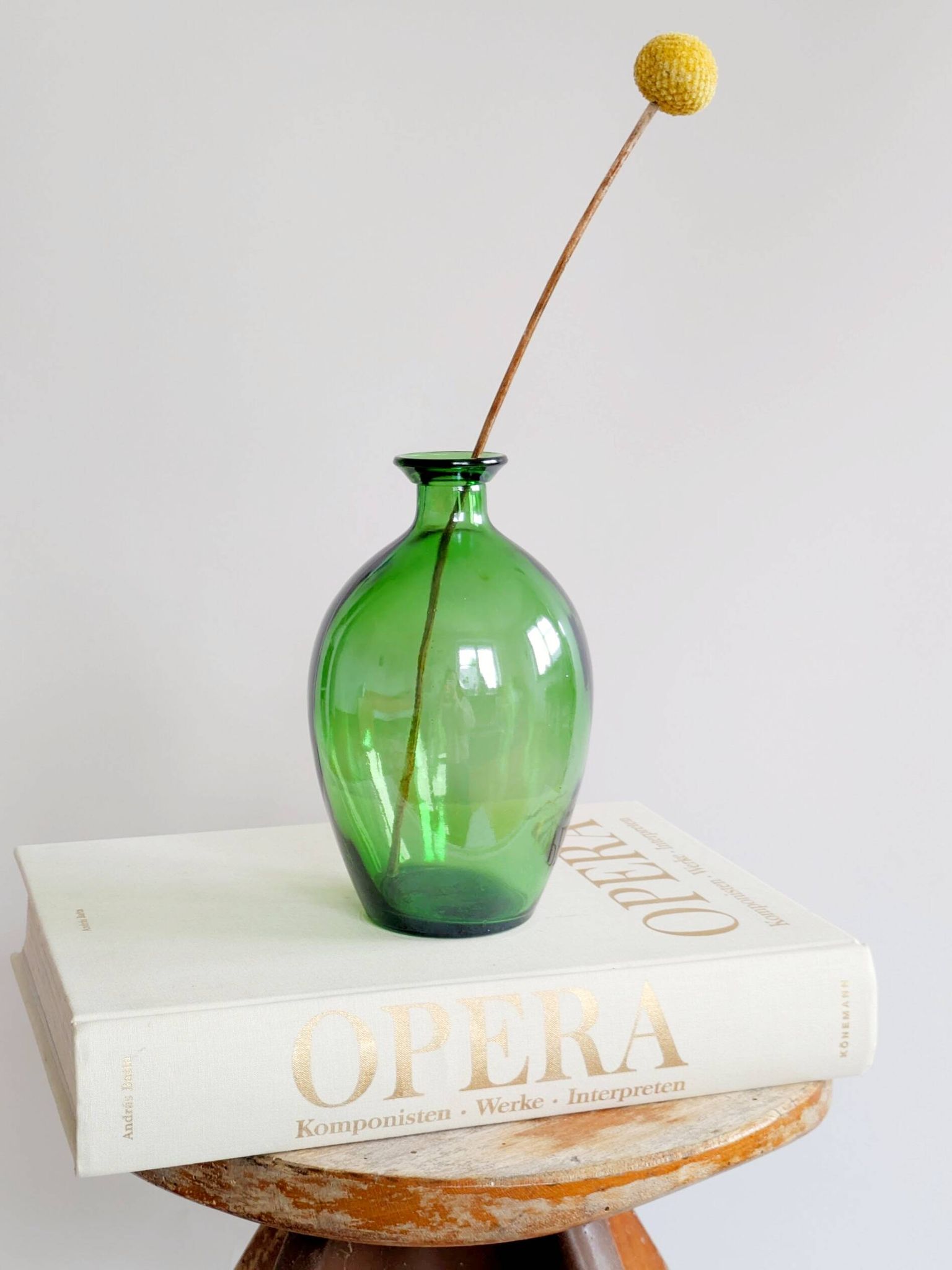 Vintage green glass bottle vase, decorative soliflore.