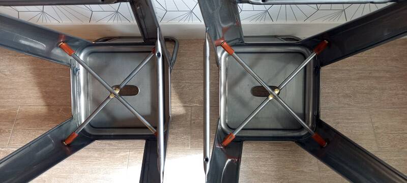 Pair of tolix hpd 75 stools – in varnished raw steel.