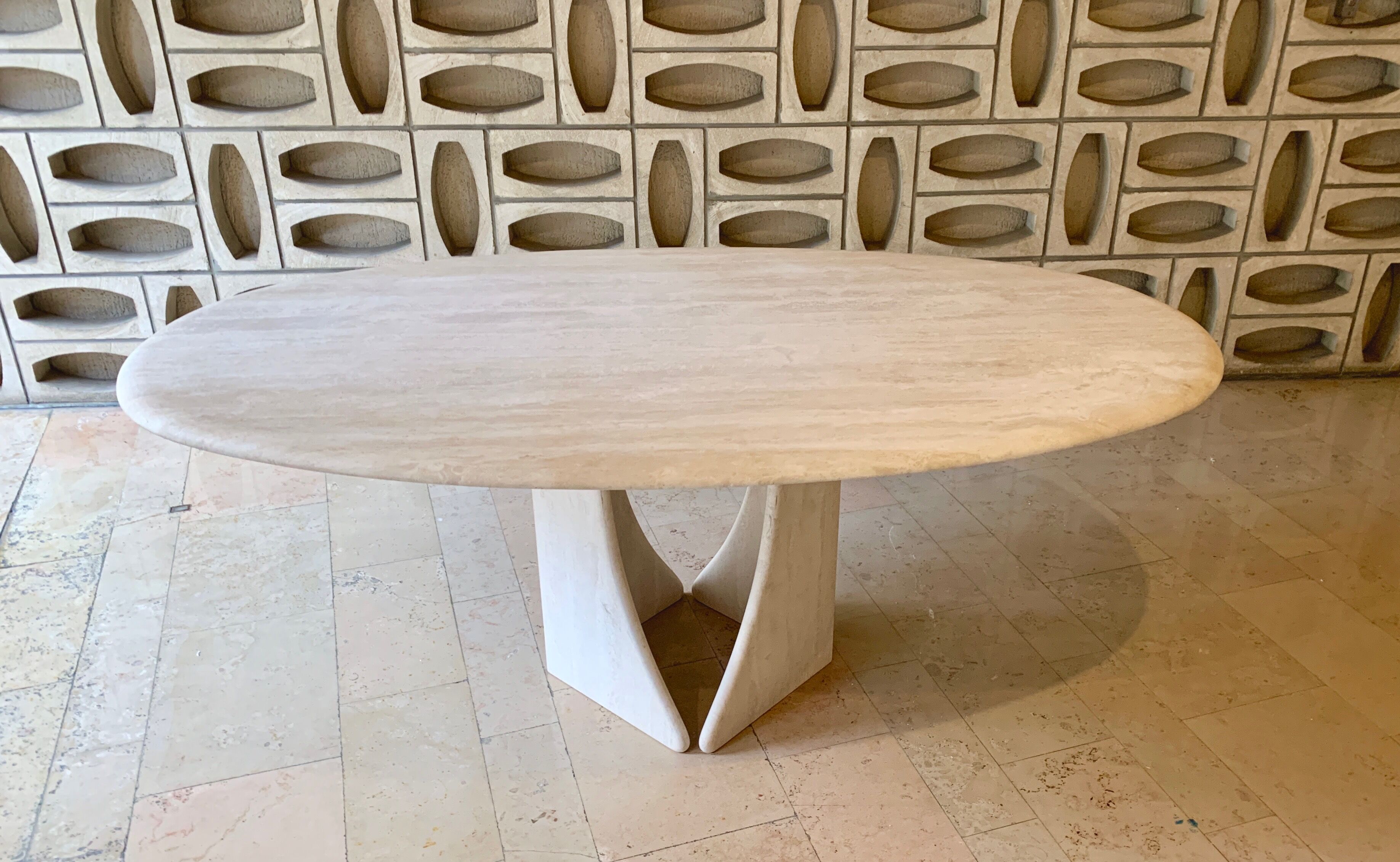 Oblong travertine dining table
