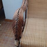 Old rattan armchair circa 1900-1930