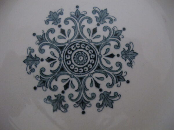 5 assiettes creuses en terre de fer de Badonviller