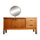 Vintage oak cabinet with circular mirror, 1960s modernist design.