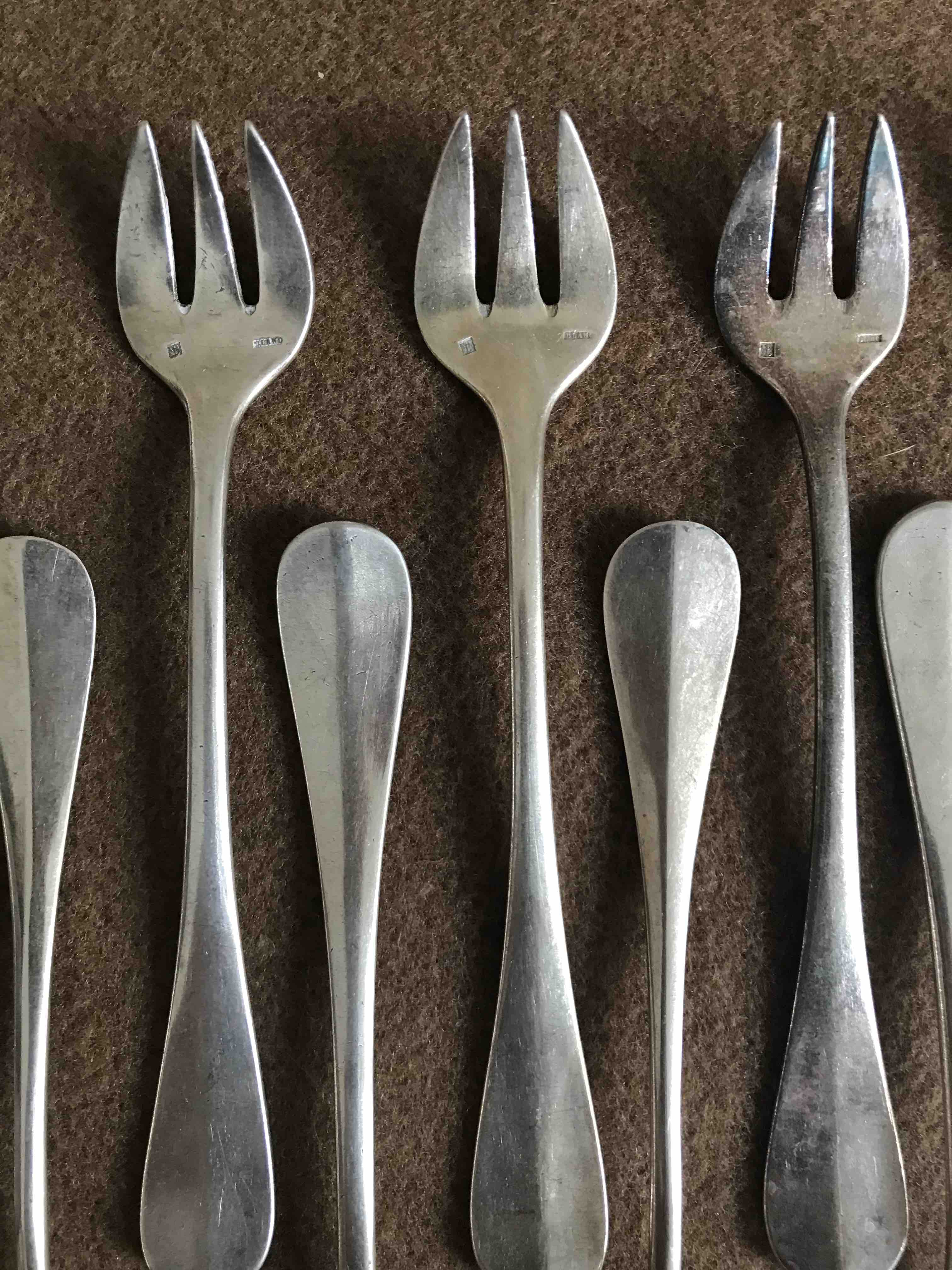 12 Silver metal oyster forks in their box