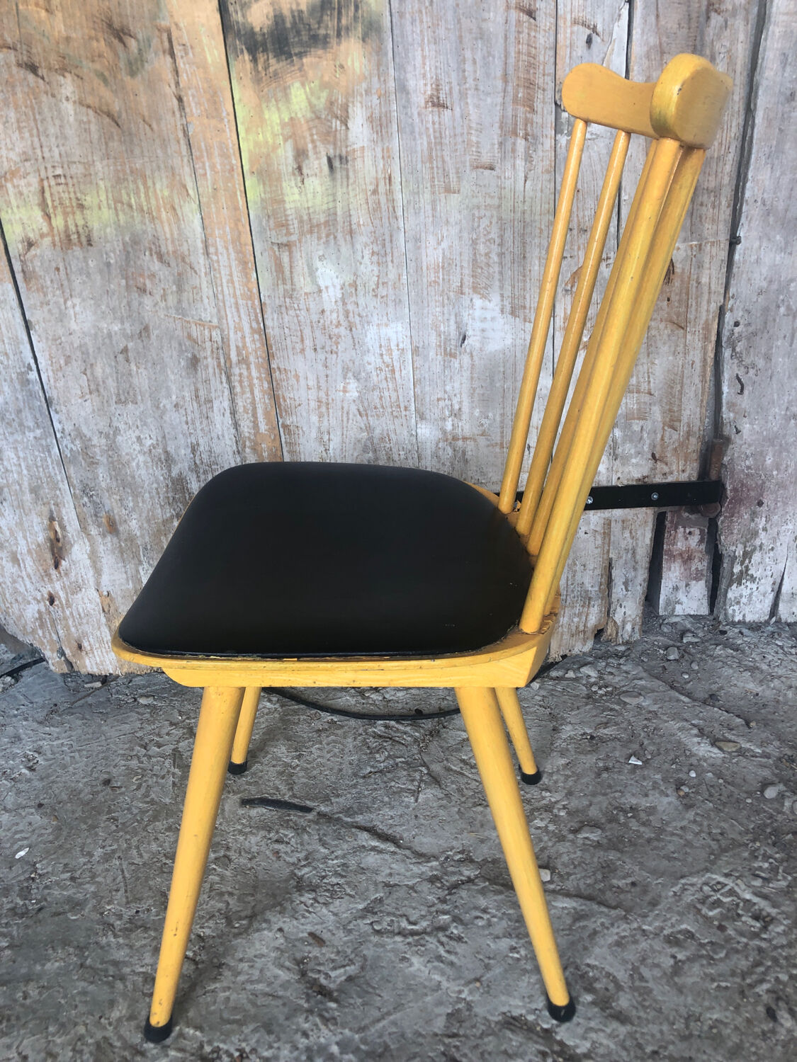 Baumann western style chair in yellow wood + vintage black skai seat