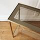 Neoclassical brass and glass console 1970