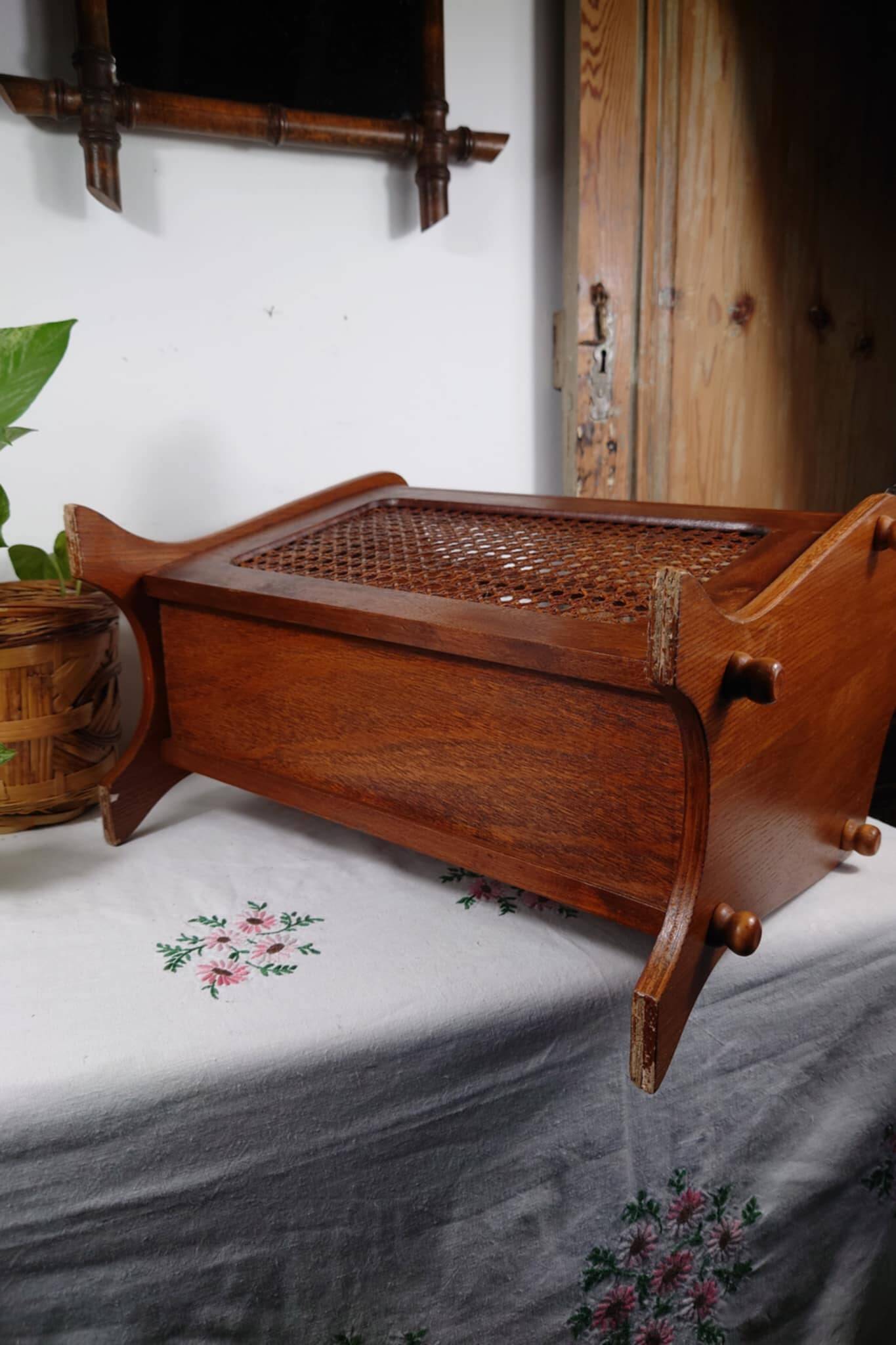 Antique wooden and cane magazine rack