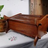 Antique wooden and cane magazine rack