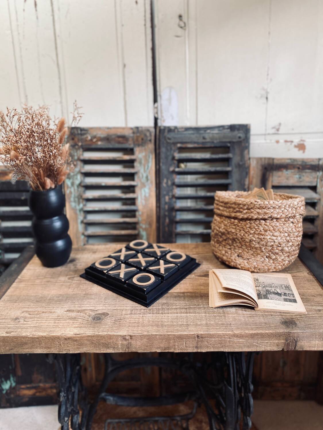 Vintage wooden table with a cast iron base.