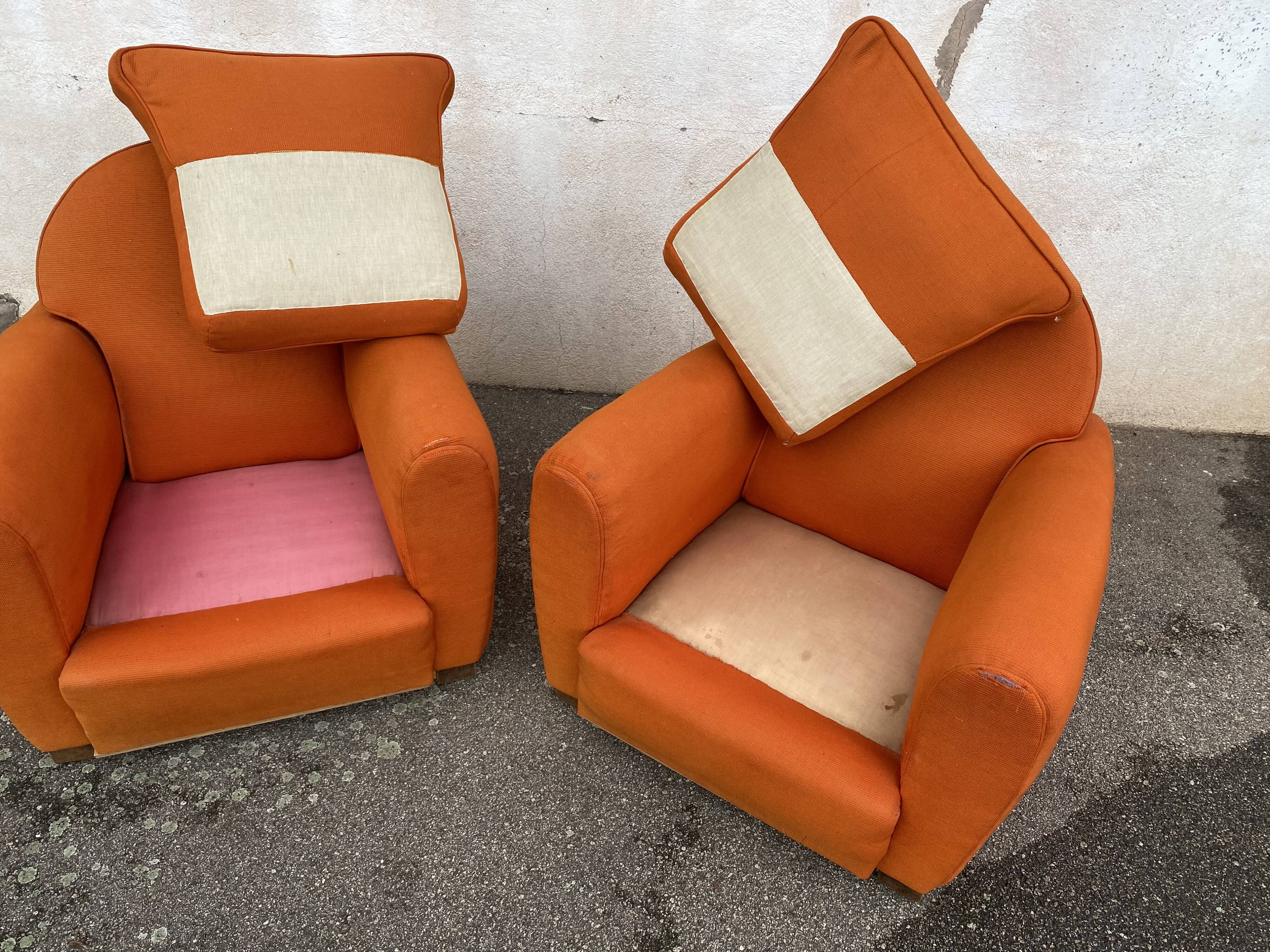 Pair of vintage orange club chairs