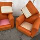 Pair of vintage orange club chairs