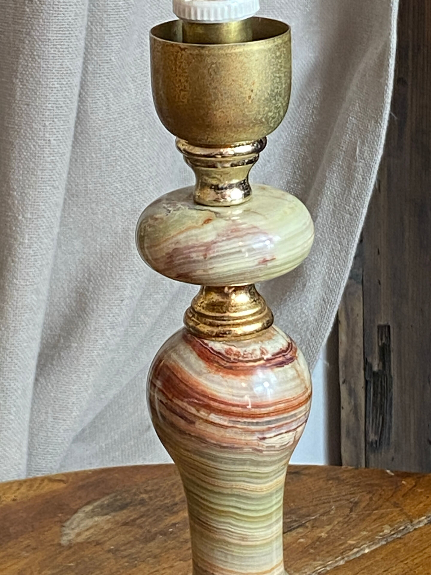 Onyx lamp, fish feet in bronze.