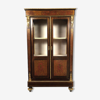 Varnished wood showcase and gold decoration in imitation of the so-called Boulle marquetry