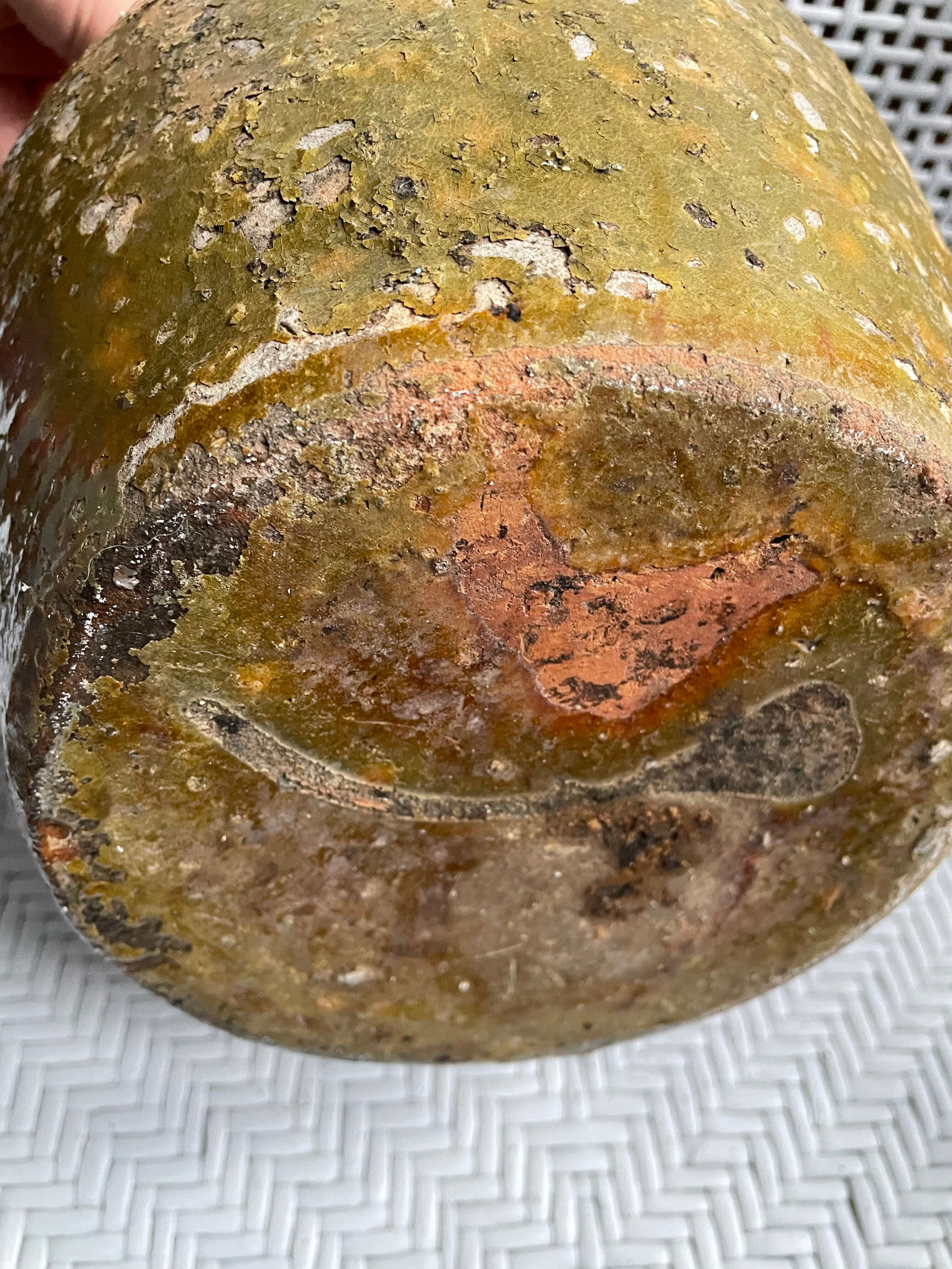 Khaki green glazed terracotta oil jar, 18th-19th century