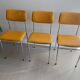 LM vintage chrome and orange/mustard yellow faux leather chairs