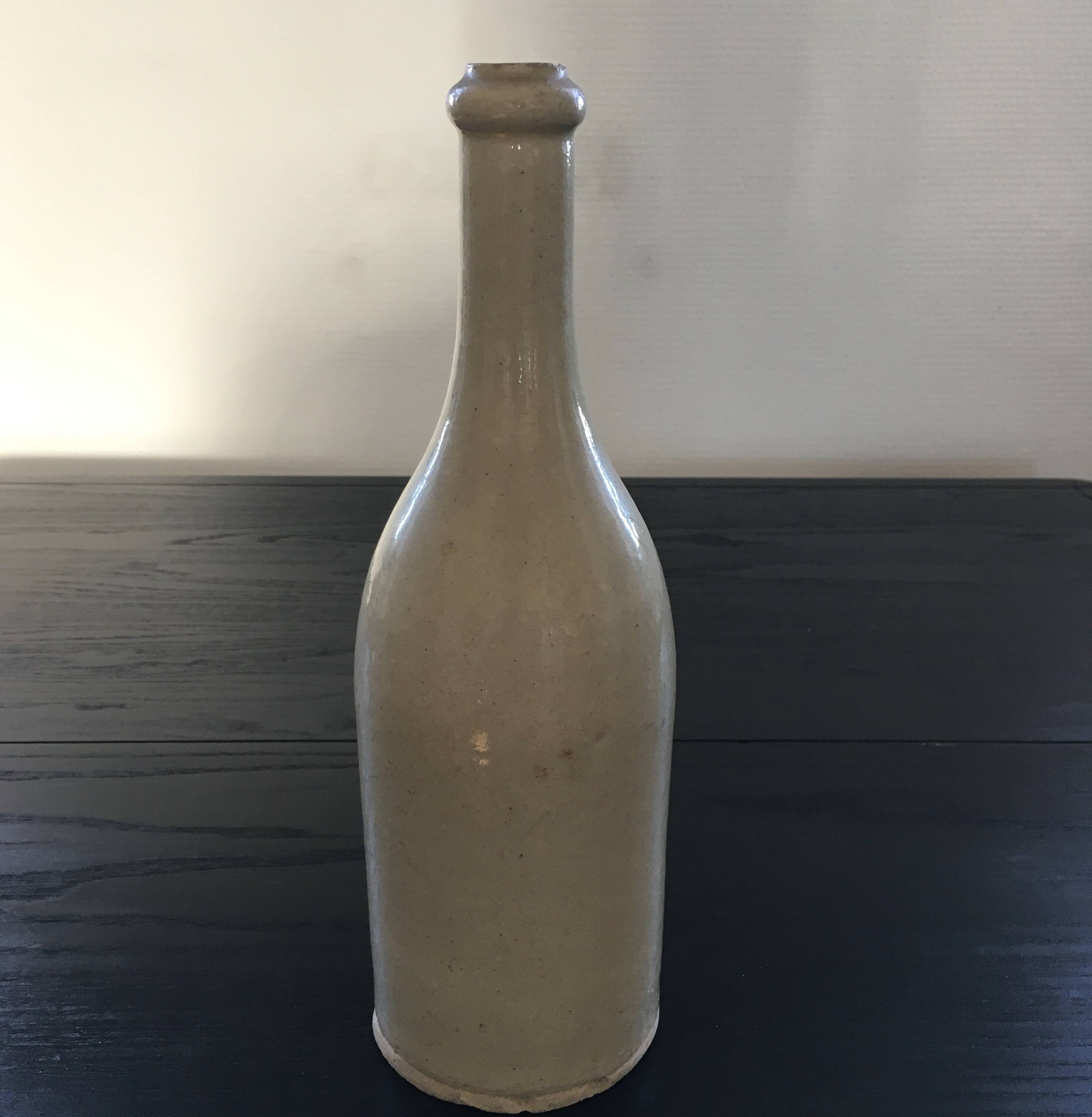 Beige stoneware bottle
