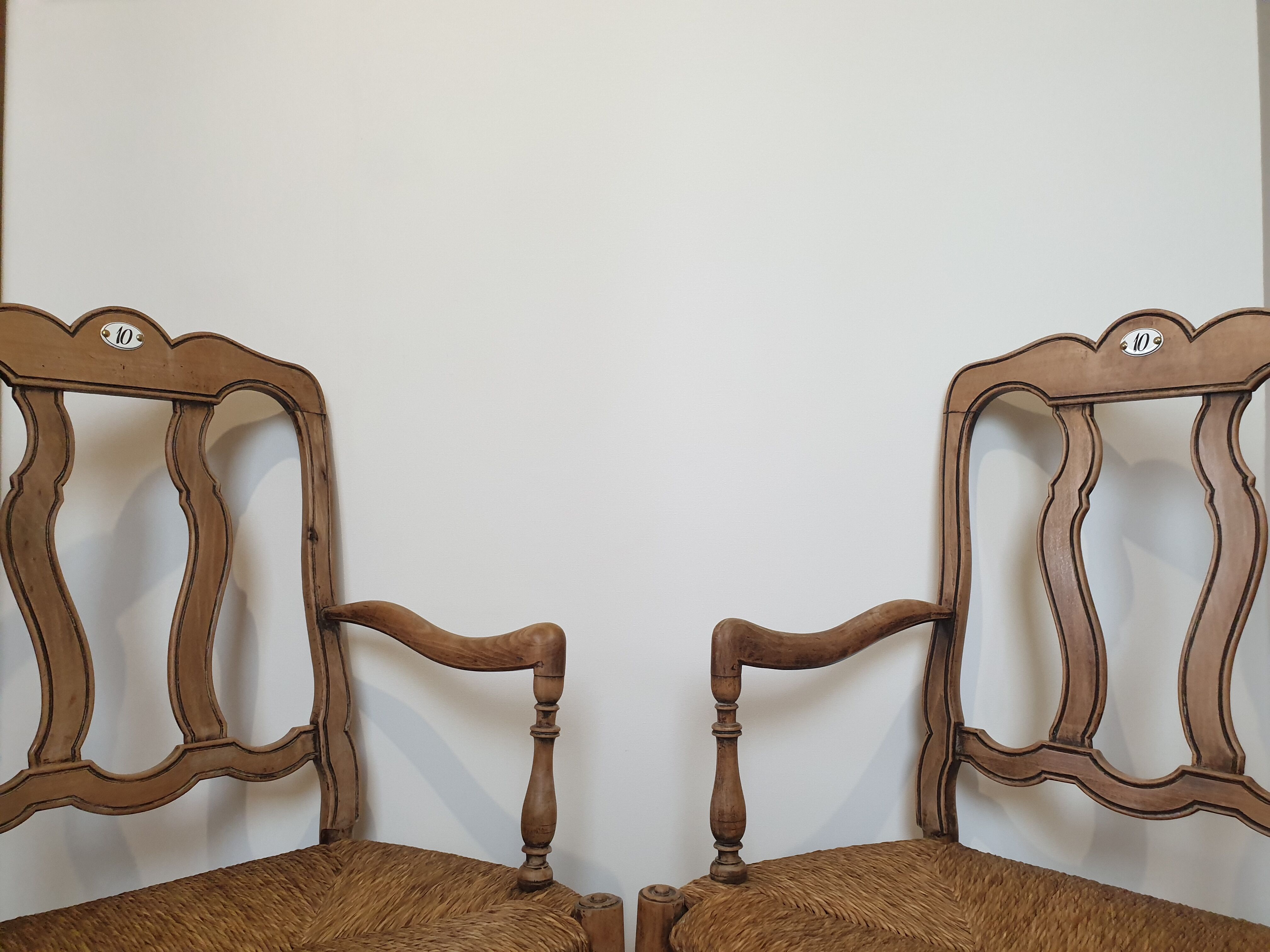 Two Hollywood Regency armchairs