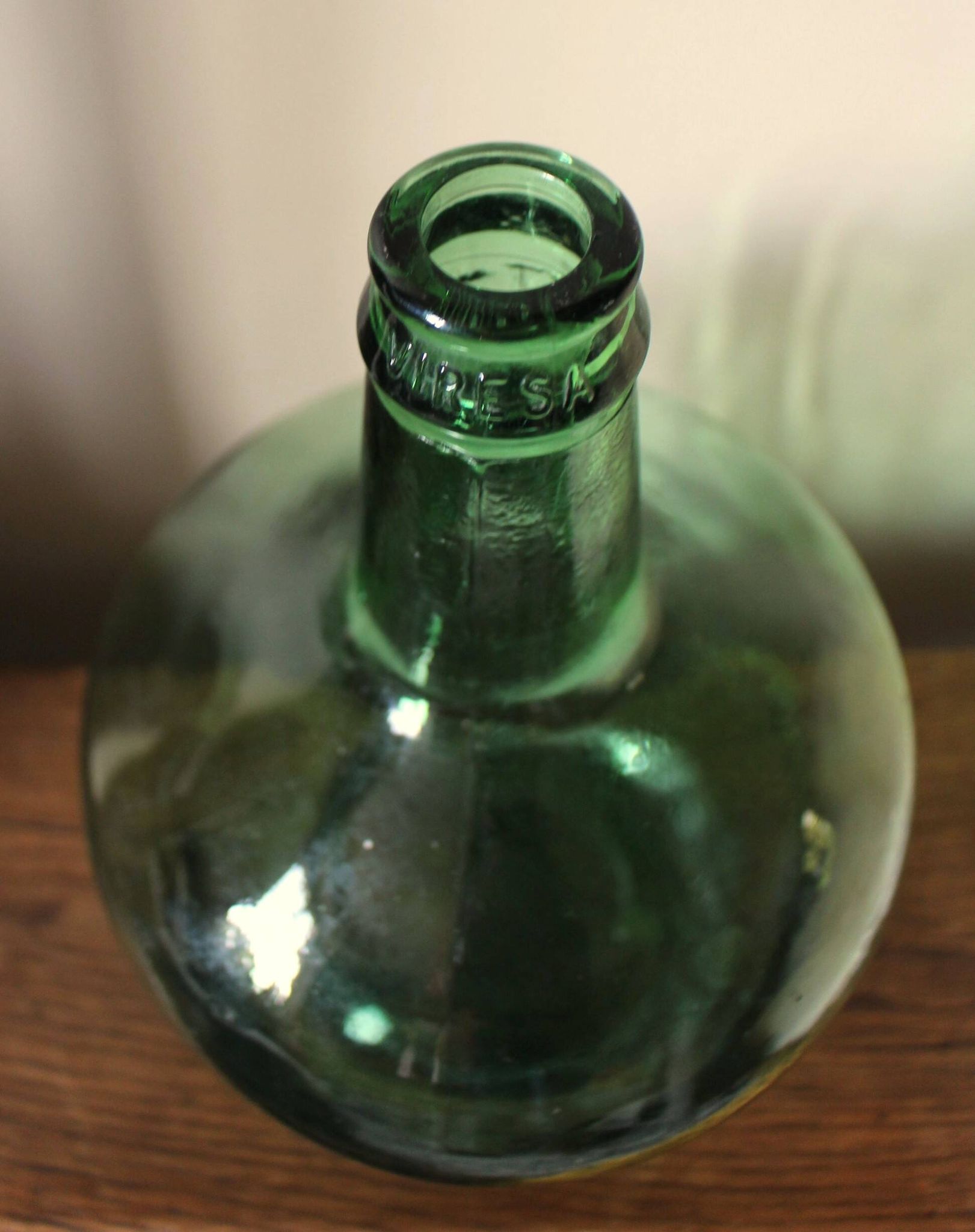 Give me a dark green glass Bonbonne jar.