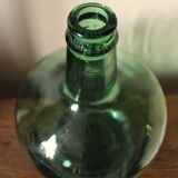 Give me a dark green glass Bonbonne jar.