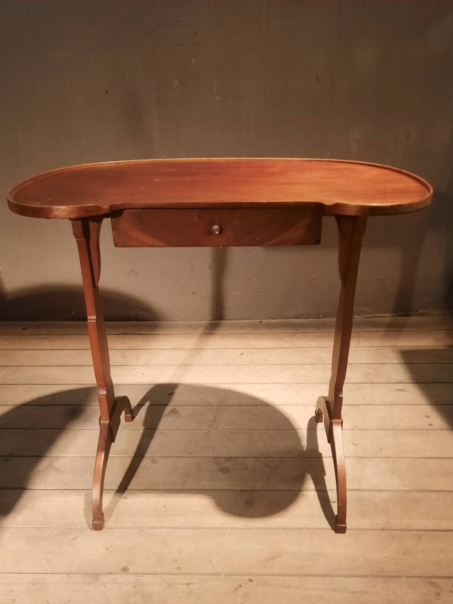 Kidney-shaped side table