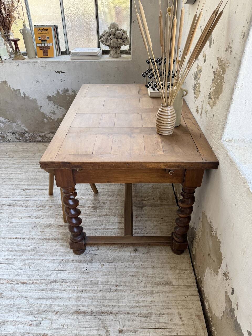 Paneled walnut desk with turned legs, 1900
