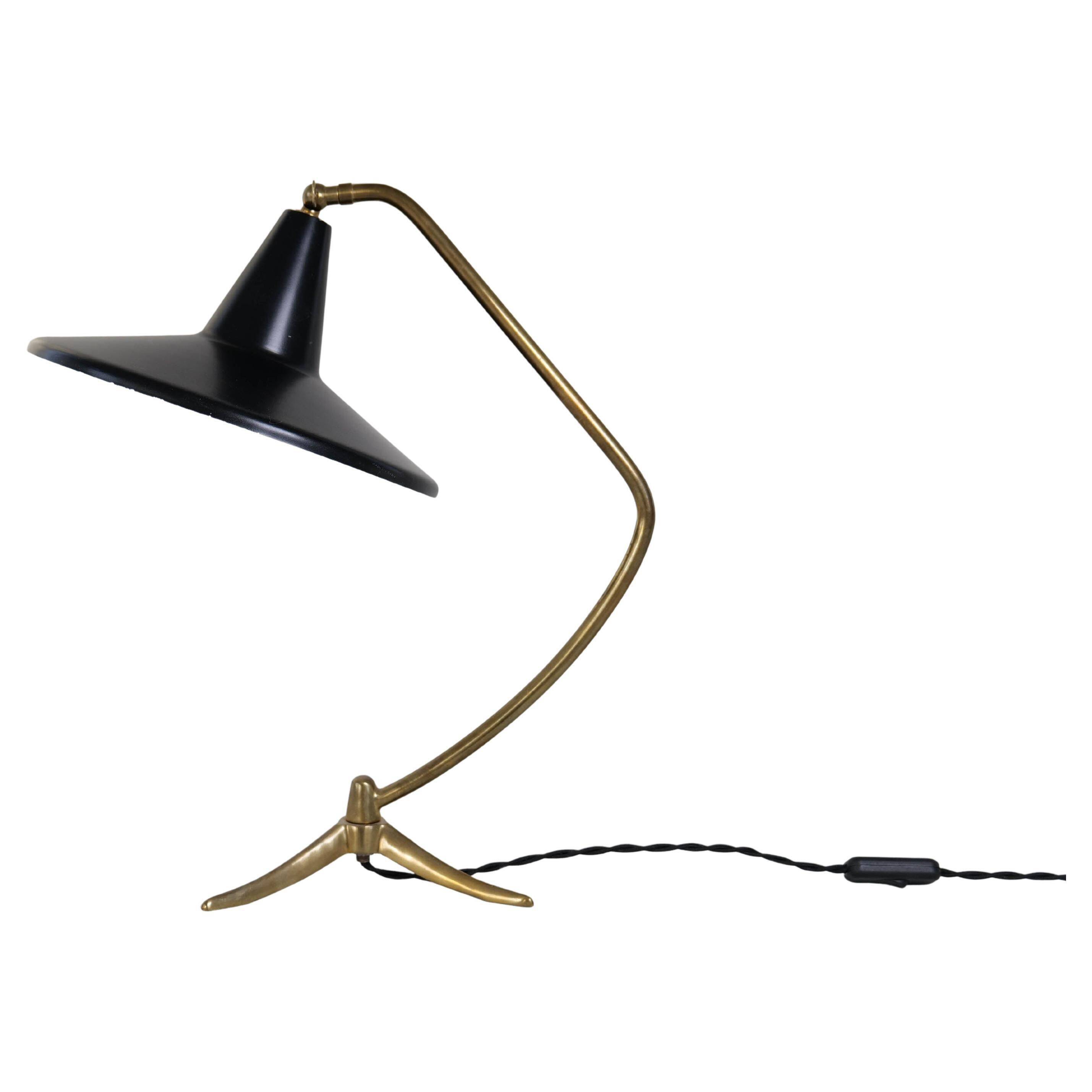 Brass table lamp on a tripod in modern Swedish style, Sweden, 1950.