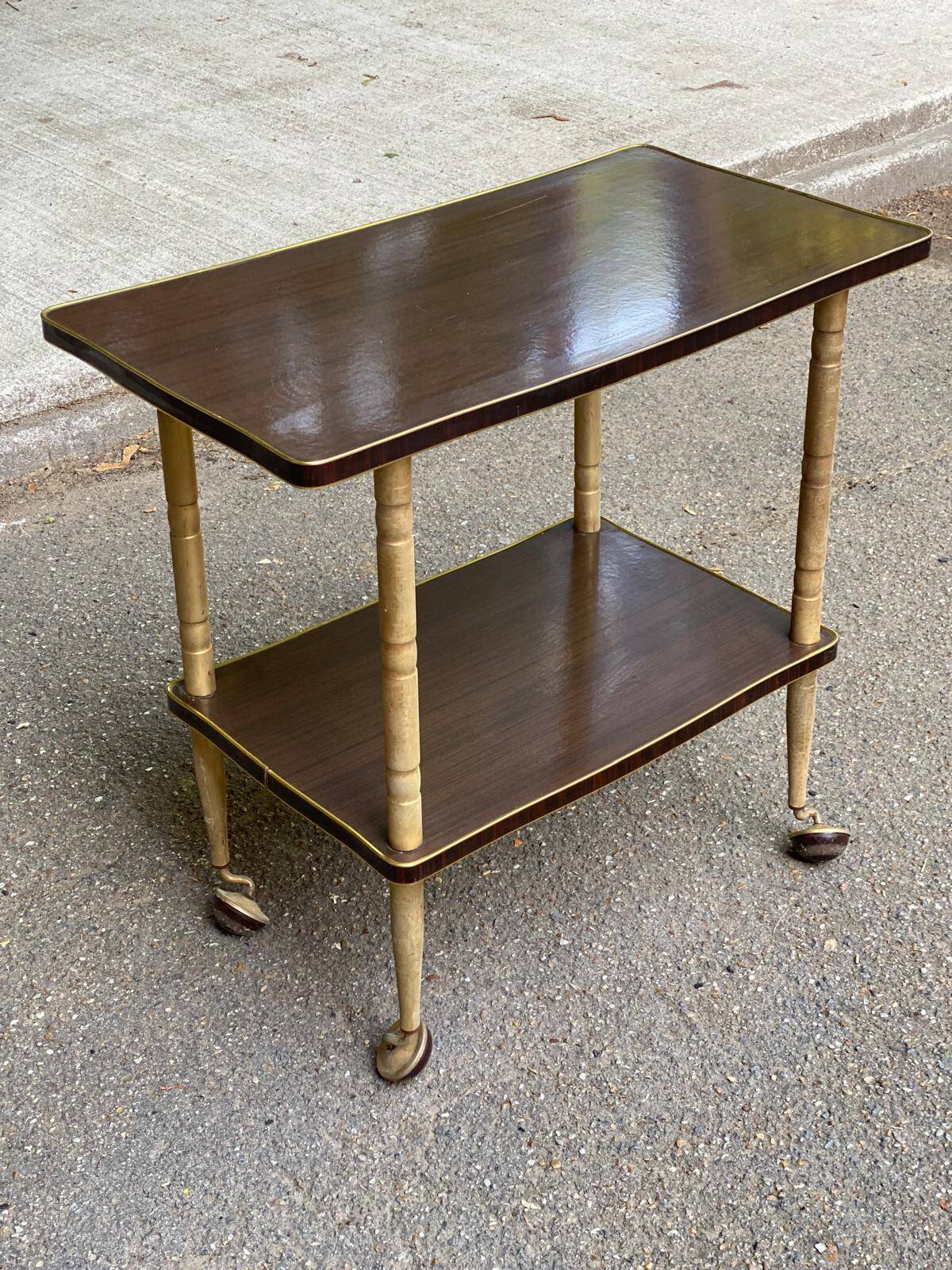 Double-tray rosewood serving trolley on gilded casters, 1970