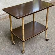 Double-tray rosewood serving trolley on gilded casters, 1970