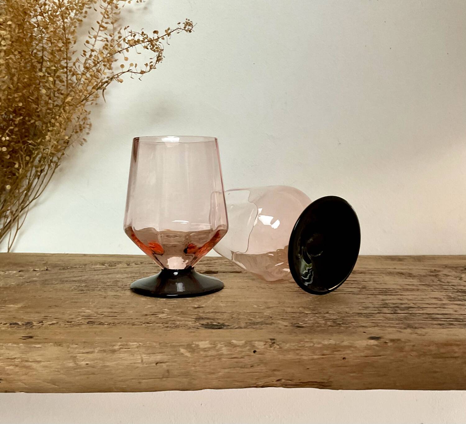 6 small pink glasses with black stem