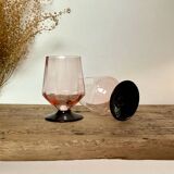 6 small pink glasses with black stem