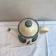 Former longchamp ceramics tea pot