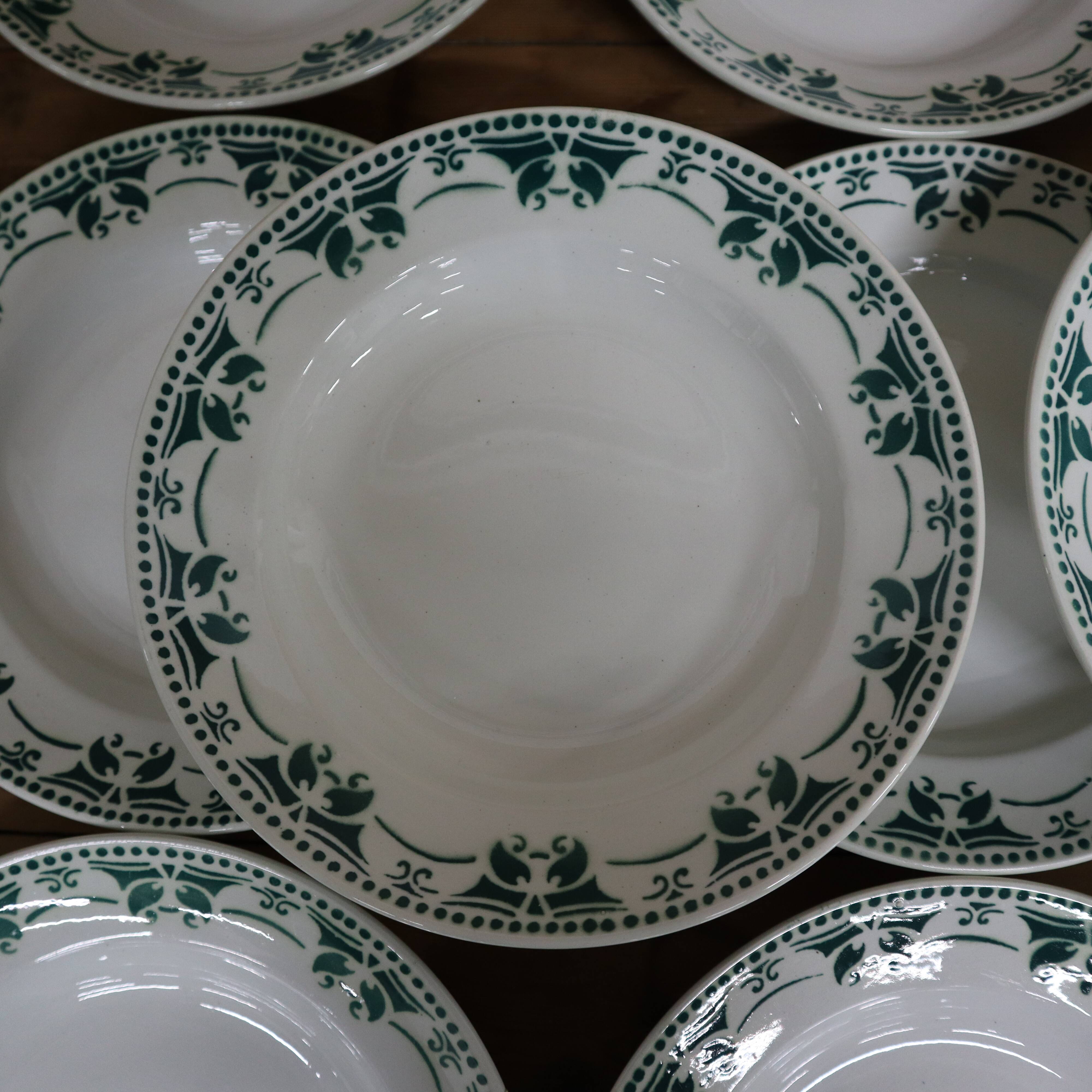 11 white and green earthenware soup plates from Saint Amand Terre de Fer