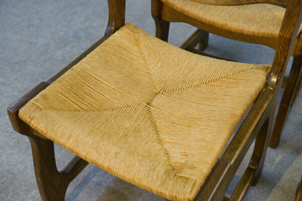 Set of 6 solid oak chairs with straw seats in the style of Guillerme and Chambron, 1950s