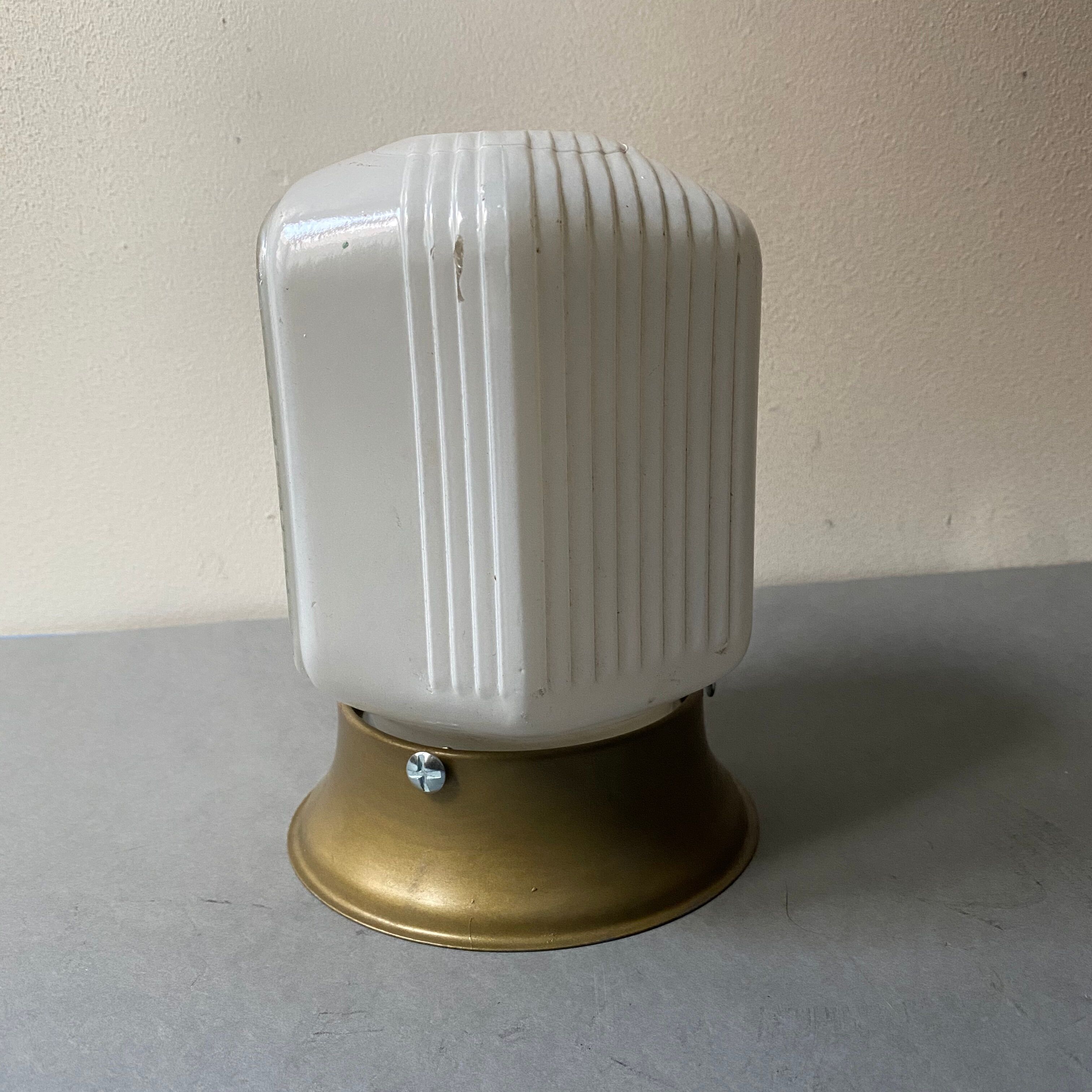 Old wall sconce in glass