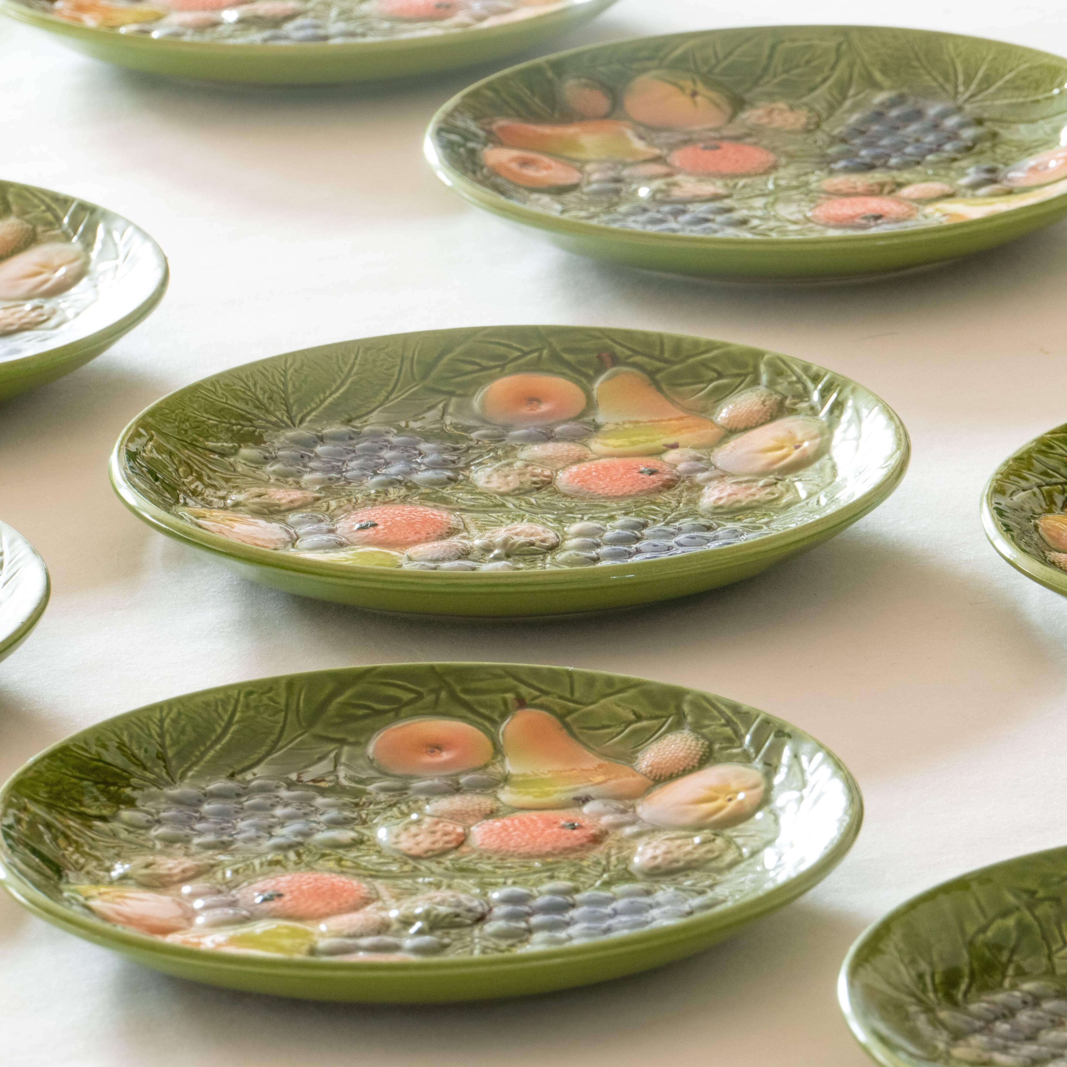 10 antique plates in fruit slip