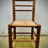 Brutalist chairs mulched in turned wood from the 60s